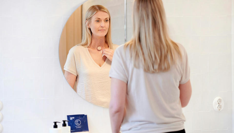 woman taking care of neck stoma